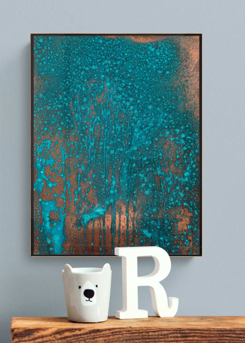 Oxidized copper wall art with running blue color, hanging in kids room