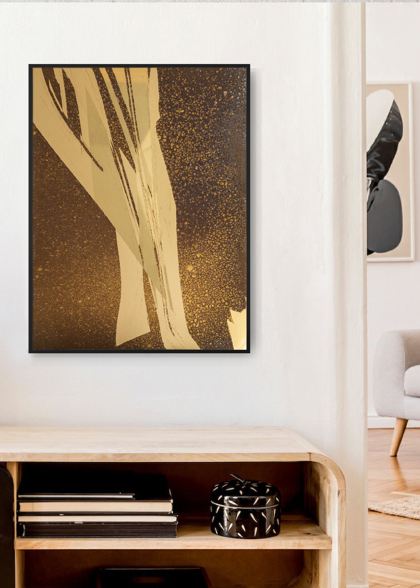 Golden oxidized details on brass sheet. Wall decor hanging on the wall in living room